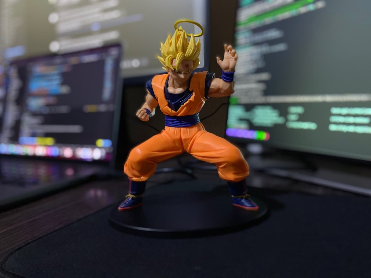 Desk setup with code on screen